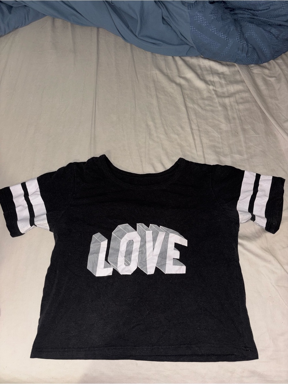 Black Crop Top with 'LOVE' Graphic and White Sleeve Stripes